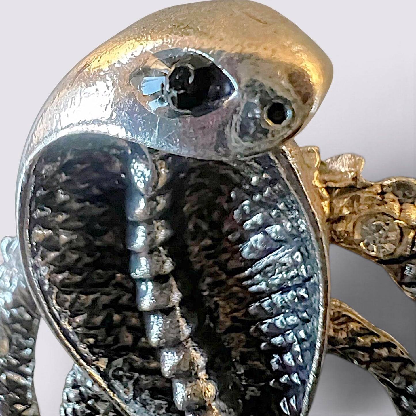 The Fashion Jewels cobra serpent statement brooch with intricate metallic detailing and sparkling accents