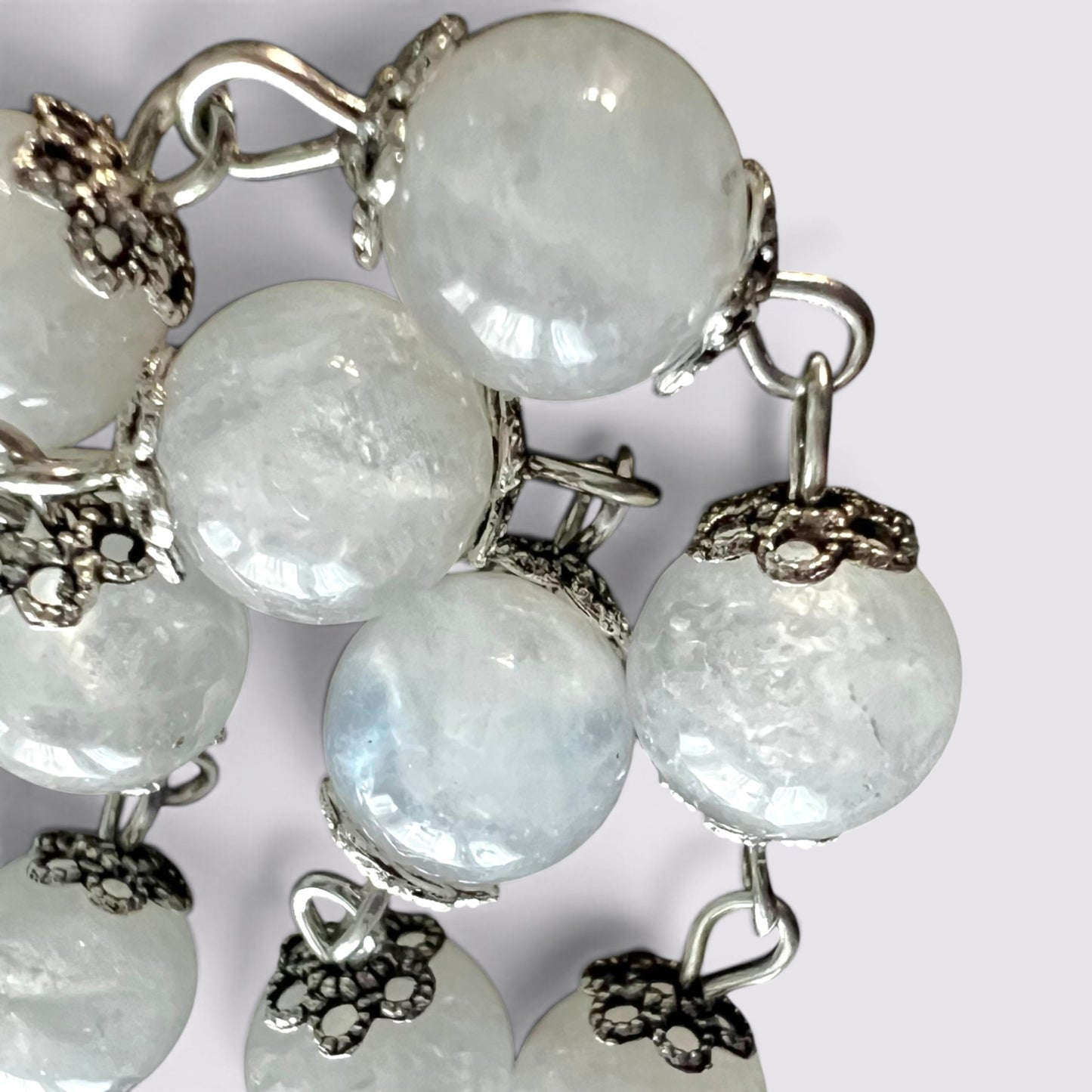 The Fashion Jewels handcrafted rosary featuring luminous moonstone beads with intricate vintage silver-tone metal caps.