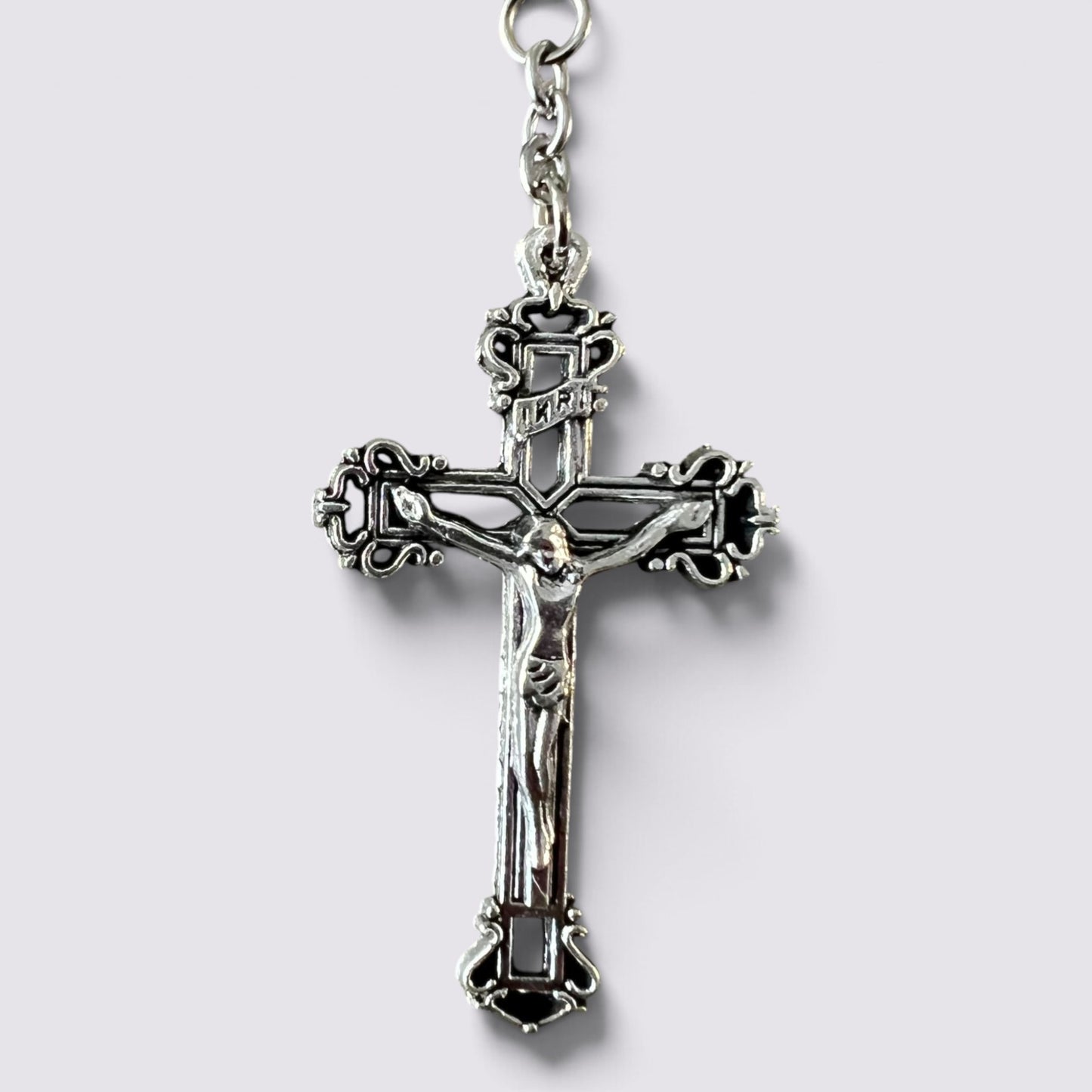 The Fashion Jewels ornate silver-tone crucifix pendant on a durable metal chain for a religious rosary necklace.
