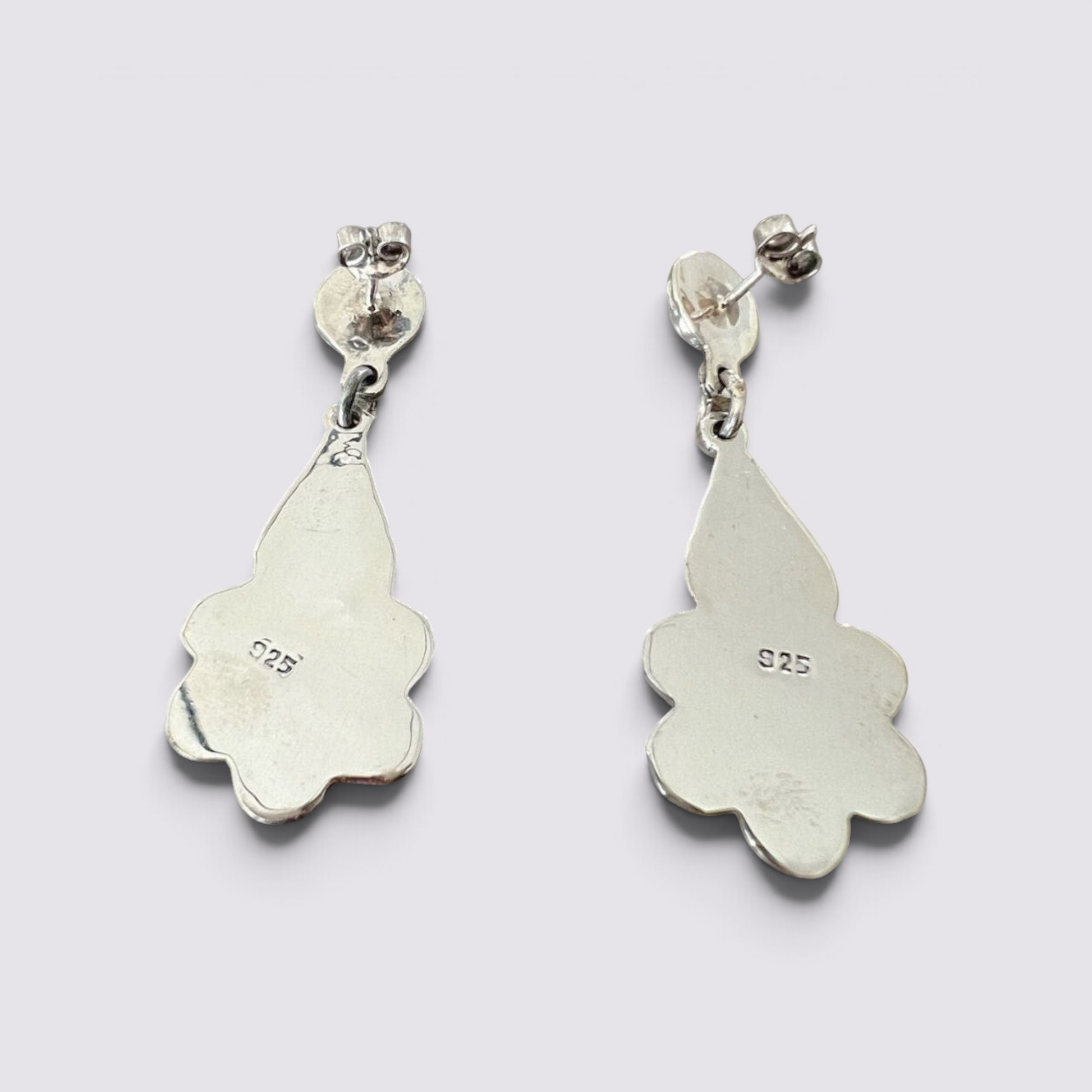 The Fashion Jewels sterling silver dangle earrings featuring 925 hallmark and intricate Byzantine-inspired metalwork.