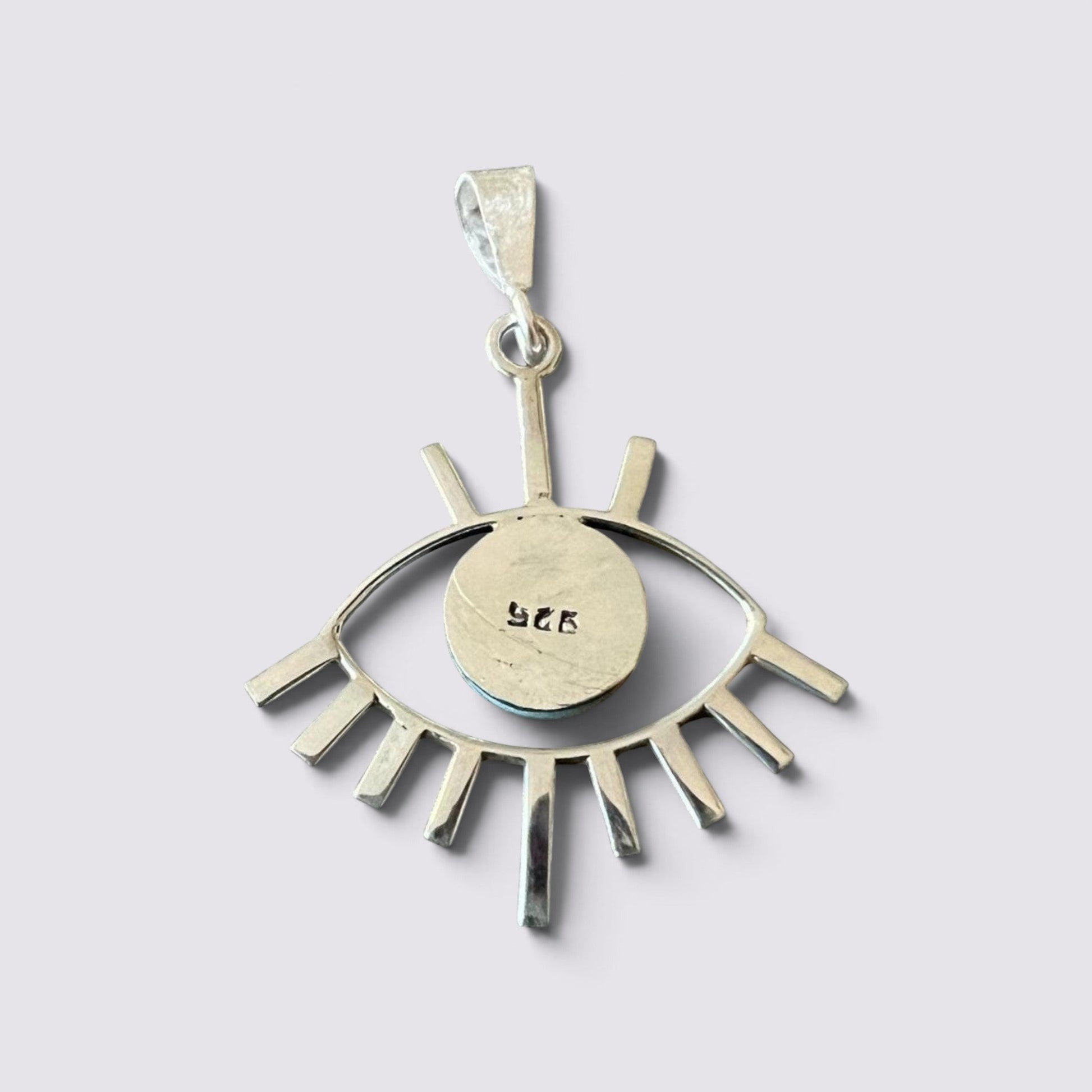 The Fashion Jewels sterling silver evil eye pendant with turquoise detail and 925 hallmark on the reverse side