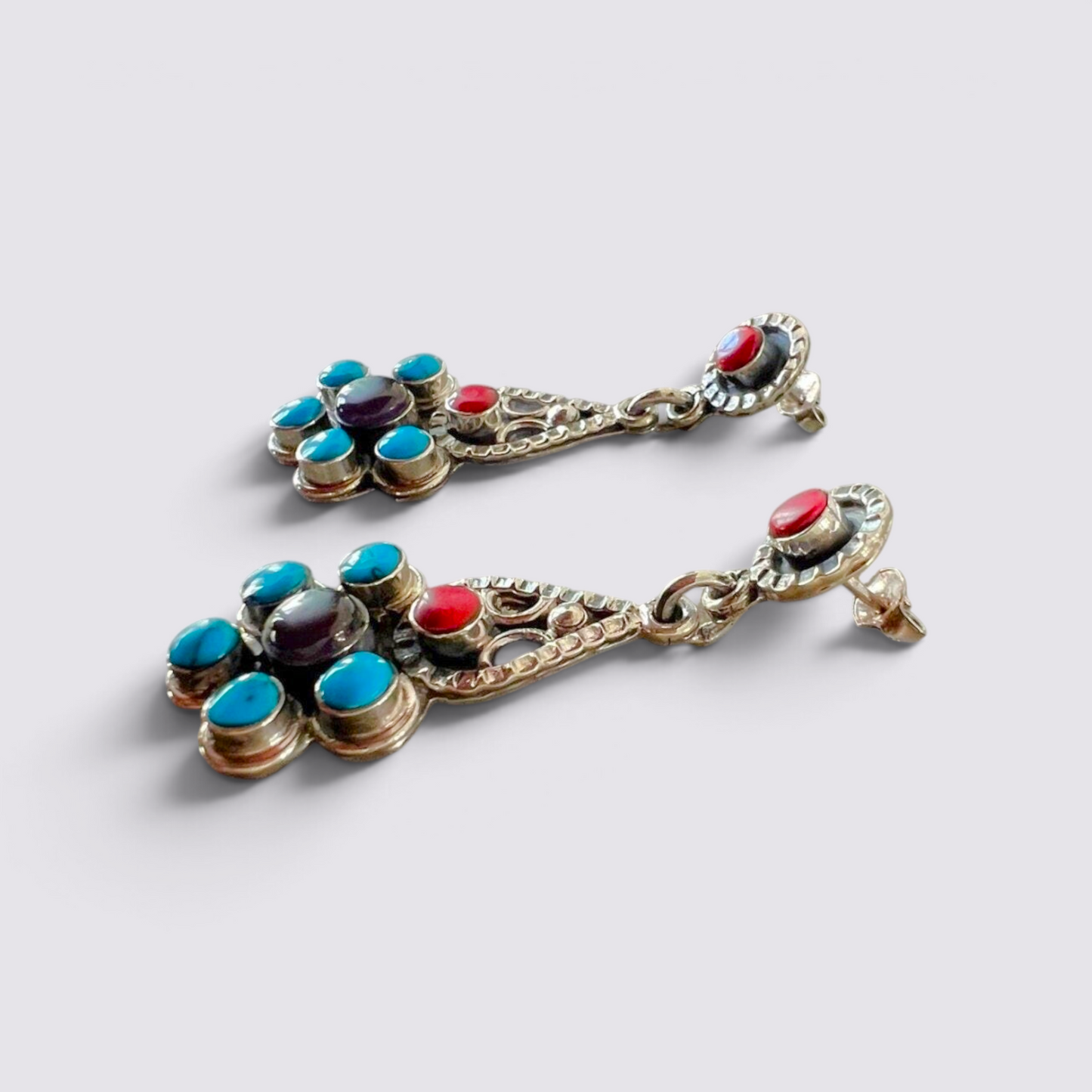 The Fashion Jewels sterling silver drop earrings with turquoise, red coral, and black stones in Byzantine style.