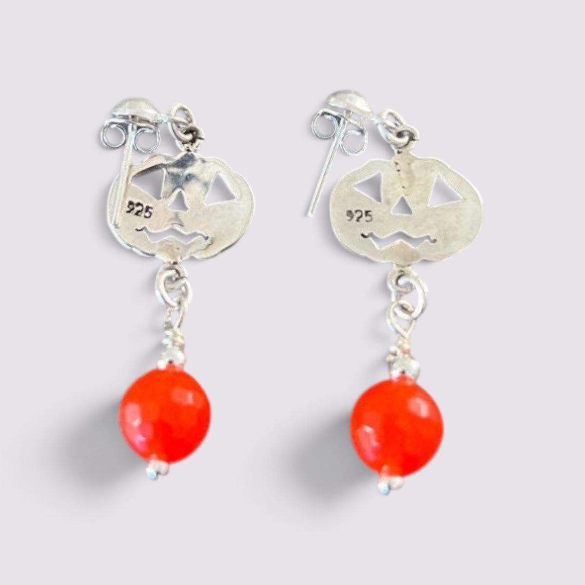 The Fashion Jewels sterling silver jack-o'-lantern dangle earrings with faceted orange beads and 925 hallmark.