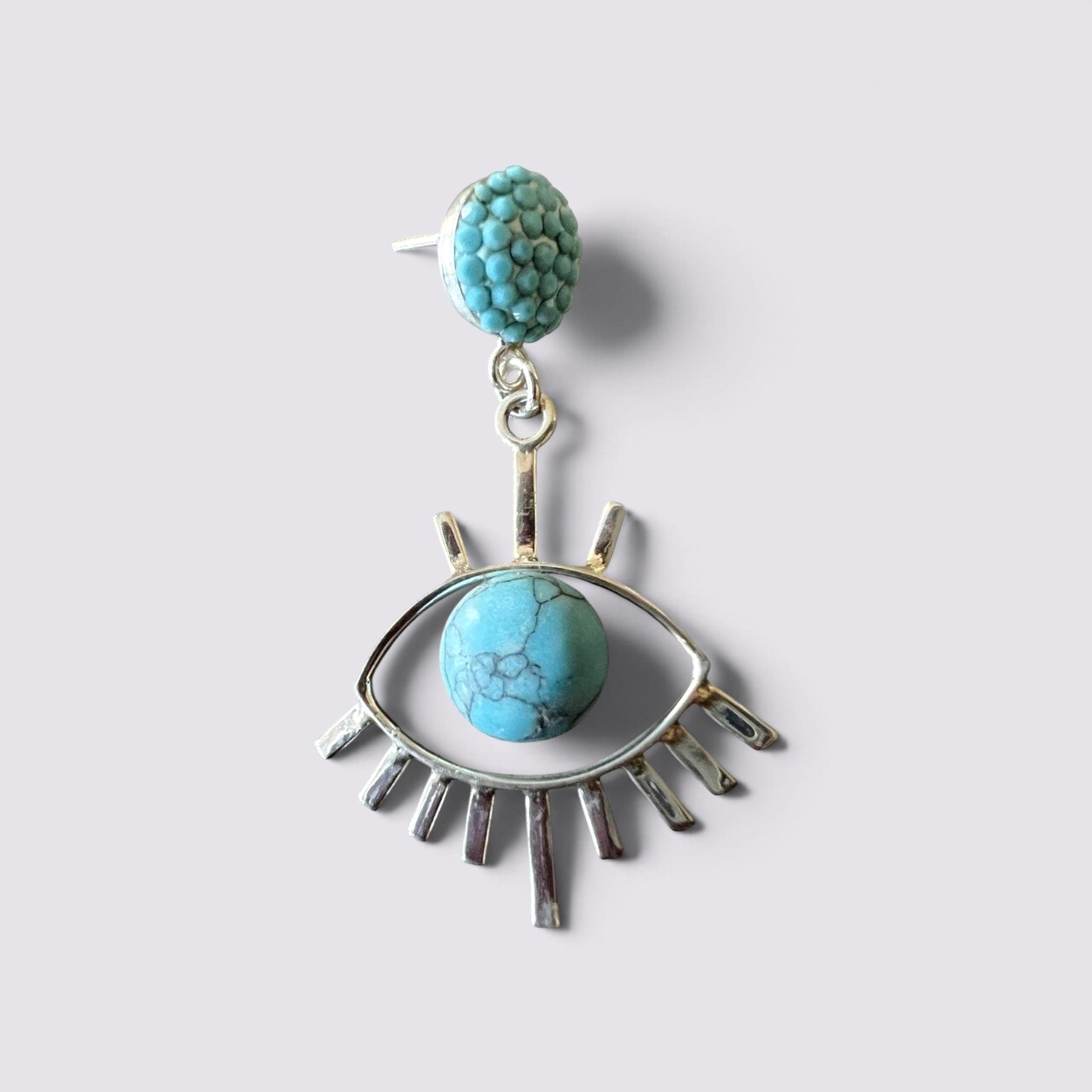 The Fashion Jewels sterling silver evil eye earring featuring a turquoise stone and textured stud detail