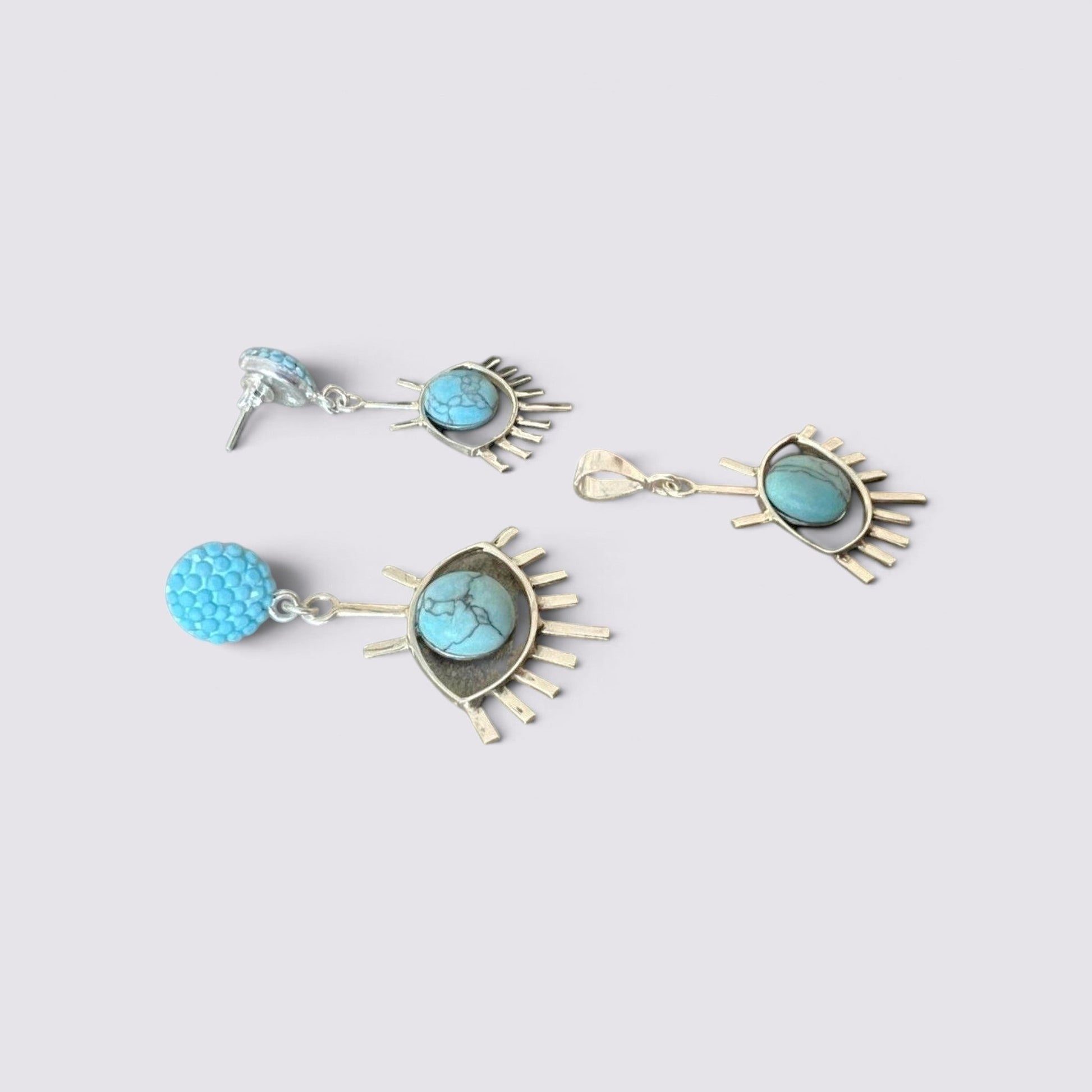 The Fashion Jewels sterling silver evil eye jewelry set featuring turquoise charms in celestial earring and pendant