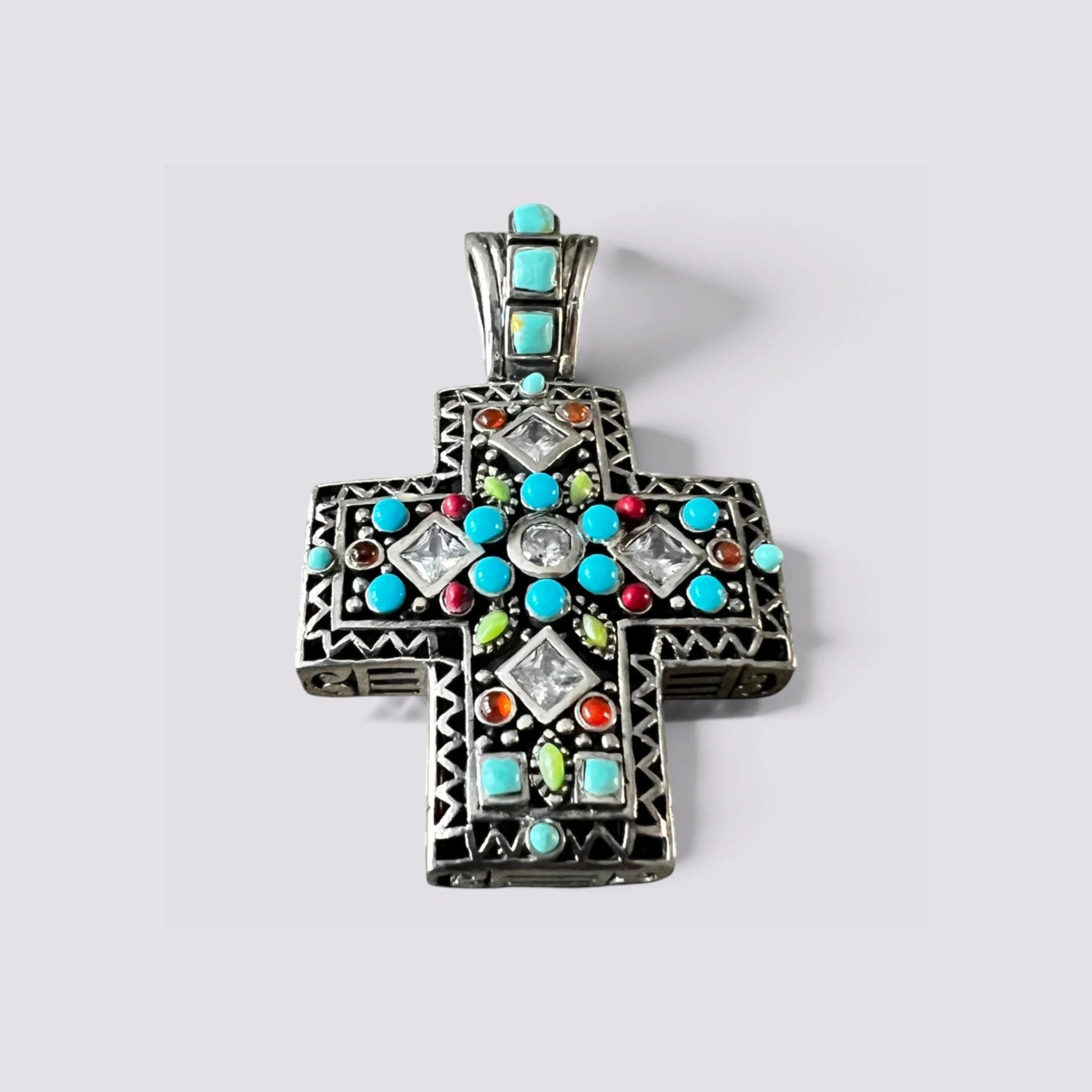 The Fashion Jewels oxidized sterling silver cross pendant featuring turquoise, zircon, and multicolor stone inlays.