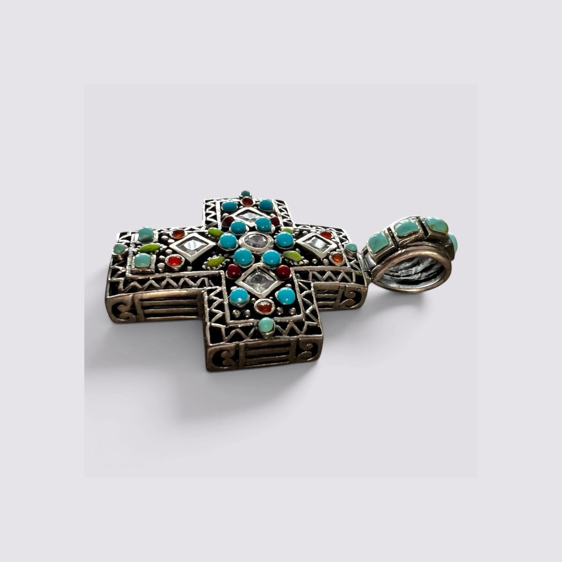 The Fashion Jewels sterling silver cross pendant with turquoise, zircon, and multicolor stones in an oxidized finish.