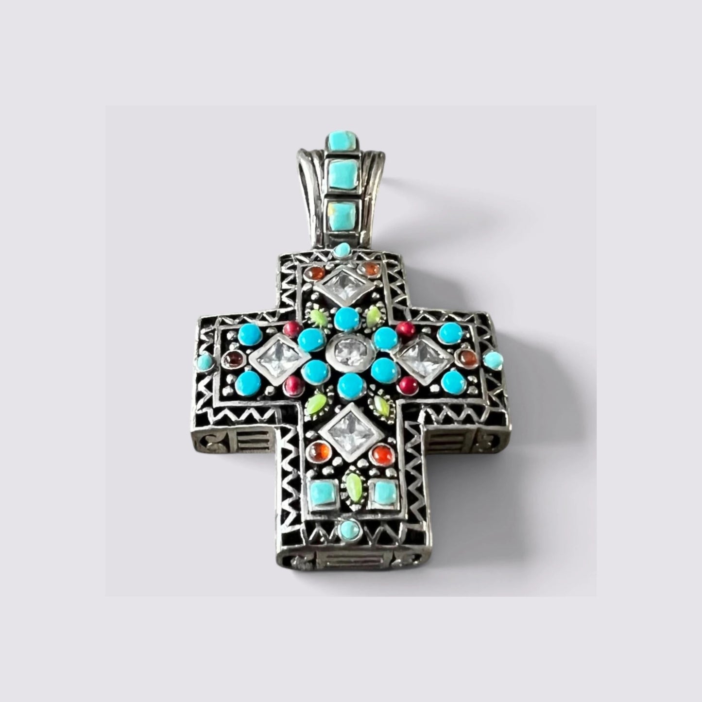 The Fashion Jewels sterling silver cross pendant with turquoise, zircon, and multicolor stones in an oxidized finish.
